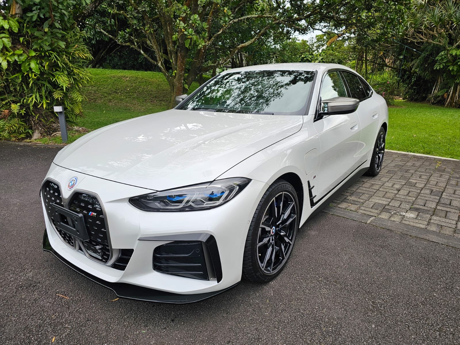 BMW i4 Gran Coupé white — delivery prep